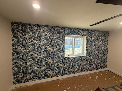 Professional wallpaper installation workspace and tools